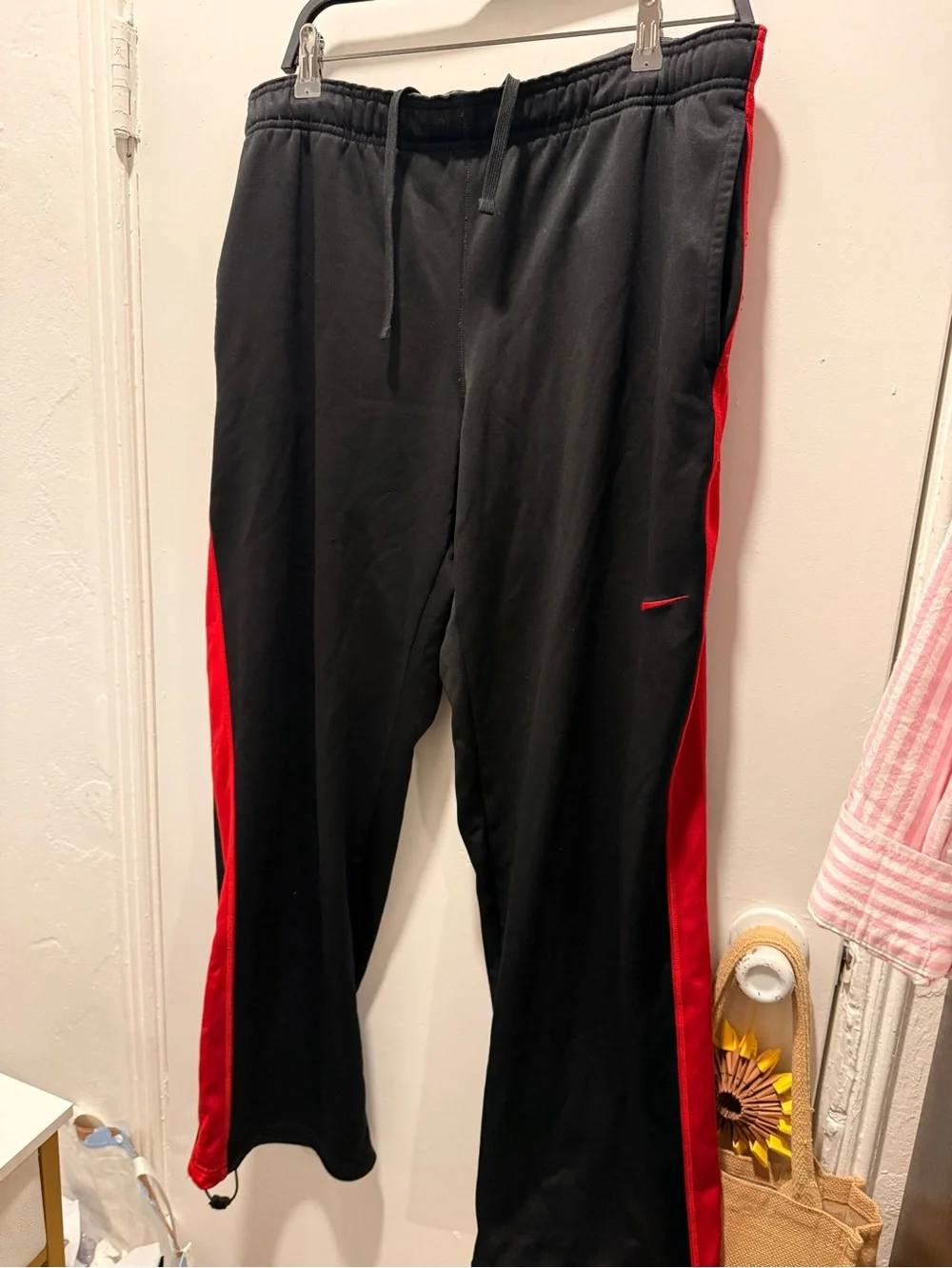 NIKE  Men's Black Track Pants with Red Side Panels
